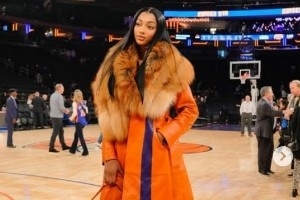 身材高挑！里斯穿尼克斯配色大衣观战NBA 绯闻男友为魔术的小卡特