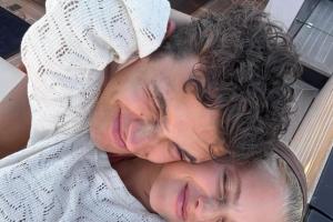 诺里斯女友晒合照：我的小小世界冠军